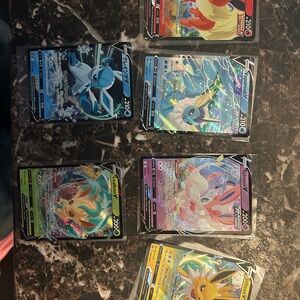 PokemonCards Eeveelutions card lot - Flareon, Jolteon + Blue, Yellow, Green, Red